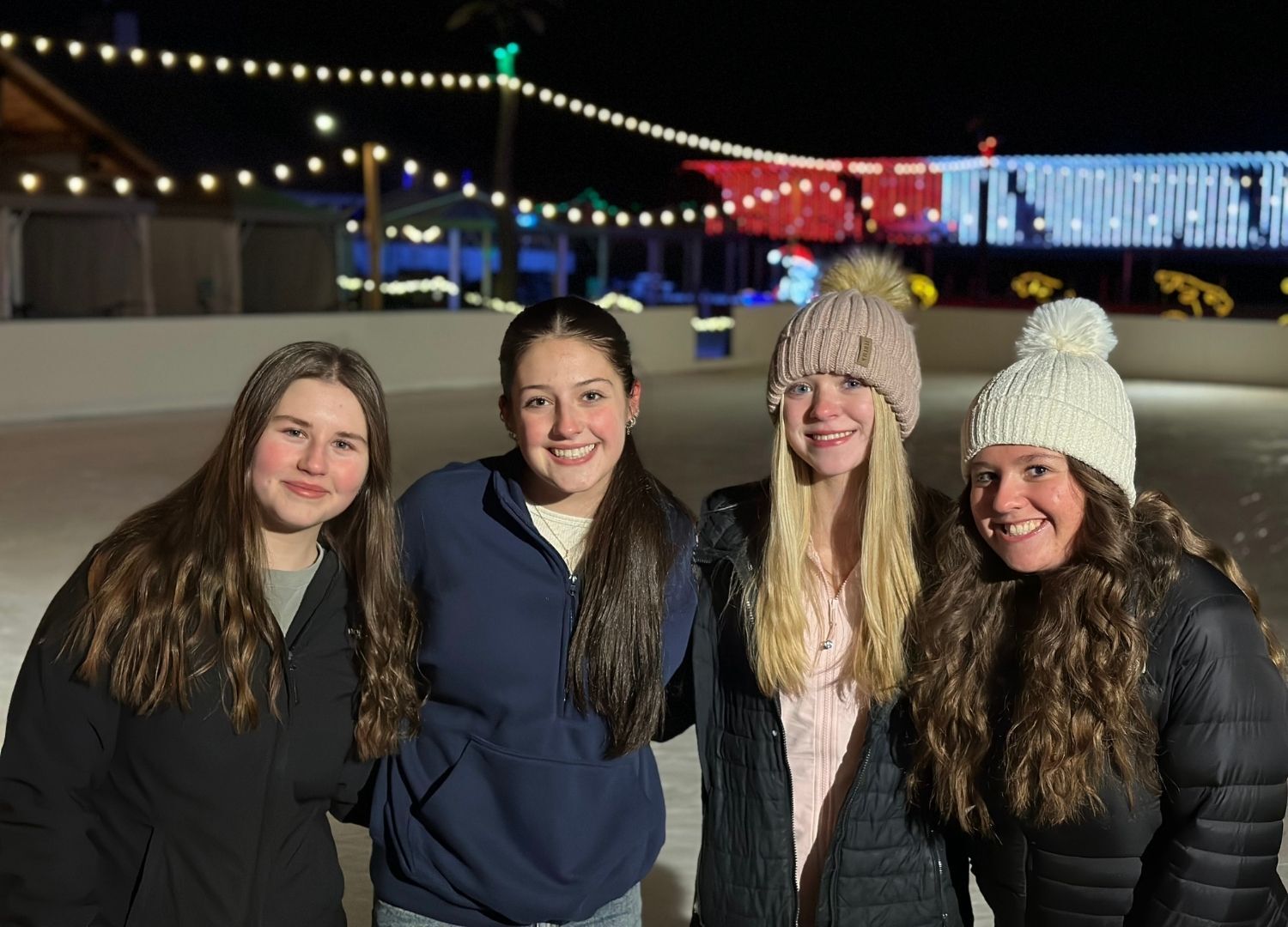 An image of a group of girls at a birthday at Candy Village ice skating.